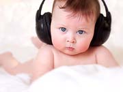 portrait of serious baby in the earphones